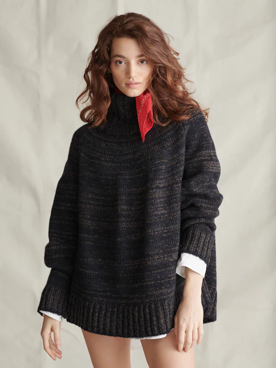 Woman wearing a black jumper